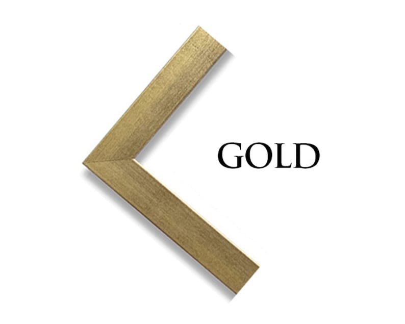 Op de afbeelding: Een gouden fotolijst hoek met een schaduw. Het woord "GOLD" is in zwart onder de hoek gedrukt.