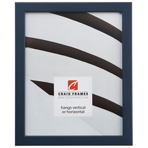 May include: A navy blue picture frame with a white mount and a white background. The frame is made of wood and has a simple design. The frame is 11x14 inches and can be hung vertically or horizontally. The frame is made by Craig Frames.