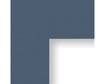 May include: A close-up of a blue mount board with a white core, commonly used for framing artwork or photographs.