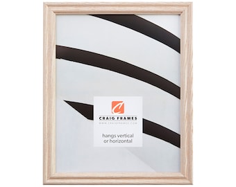 May include: A natural wood picture frame with a light wood finish. The frame is ready to hang vertically or horizontally. The frame is made by Craig Frames.