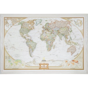 May include: A framed world map with a white background and gold accents. The map is titled "The World" and features the National Geographic logo. The map shows the continents and oceans of the world, with country borders and major cities labeled.