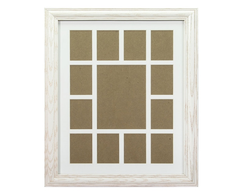 May include: White wooden picture frame with 16 openings for photos. The frame has a distressed white finish and a simple design.