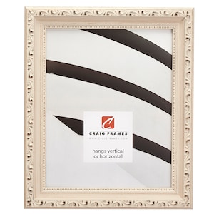 May include: A white ornate picture frame with a decorative border. The frame is made of wood and has a matte finish. It hangs vertically or horizontally. Craig Frames www.craigframes.com