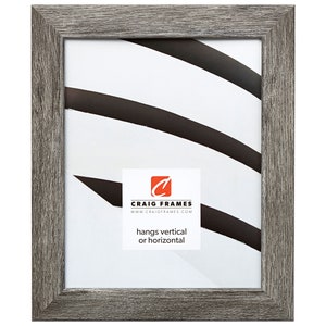 May include: A rectangular gray wooden picture frame with a white mat. The frame has a textured wood grain appearance. The frame includes the text "hangs vertical or horizontal" and the logo for Craig Frames.