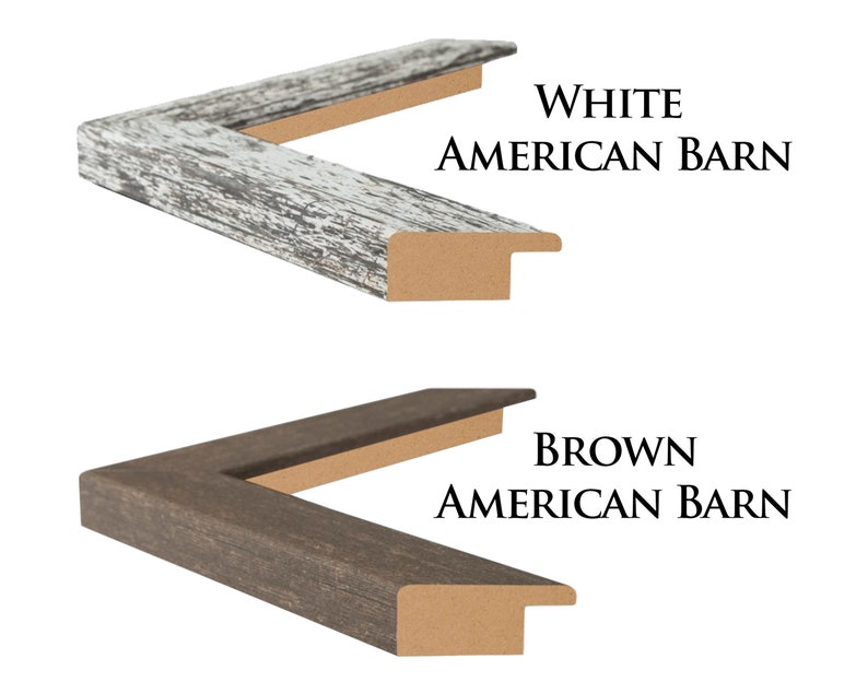May include: Two wooden picture frames with a distressed finish. The top frame is white and the bottom frame is brown. Both frames have the text "AMERICAN BARN" printed on them.