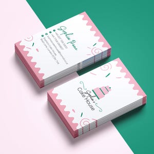 May include: Two stacks of business cards with a pink and white design. The cards feature the text "Sophia Pane" and "Sophia's Cake House" along with contact information. The background is a split of pink and teal.