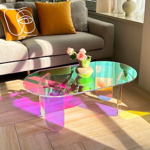 May include: A set of three ceramic mugs with a speckled, matte finish. Each mug features a different color: light blue, cream, and gray. The mugs have a simple, modern design and a comfortable handle. Perfect for coffee or tea.