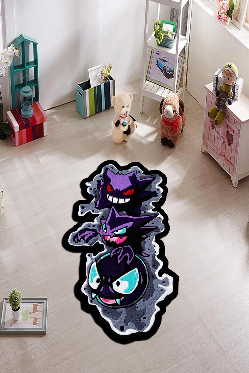 May include: A colorful, cartoon-style rug featuring three stacked ghost characters in shades of purple, black, and blue. The rug has a black border and a gray, smoky background. This decorative rug is suitable for a child's bedroom or playroom.