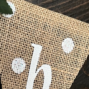 This photo is an up close shot showing the iridescent glitter on the white polka dots.