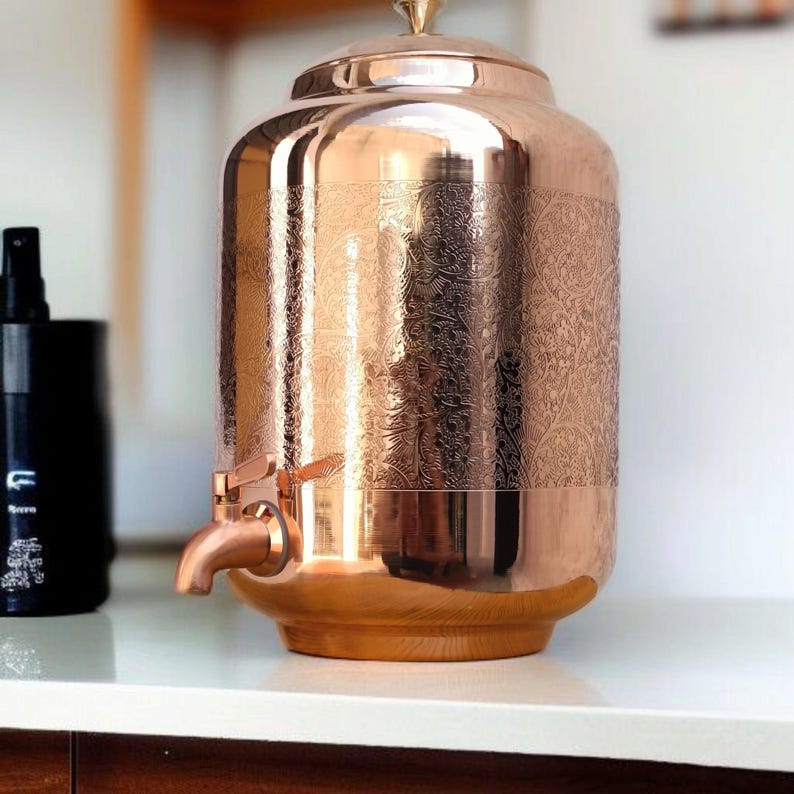 May include: A set of three ceramic mugs with a speckled, matte finish. The mugs are in shades of cream, light brown, and dark brown. Each mug has a simple, minimalist design, perfect for coffee or tea.