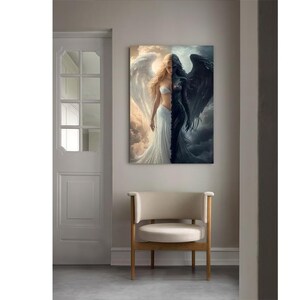 May include: A rectangular wall art print featuring a split-figure composition. One side depicts a light-skinned figure with large white wings and a white dress against a golden sky. The other side shows a dark-skinned figure with black wings.