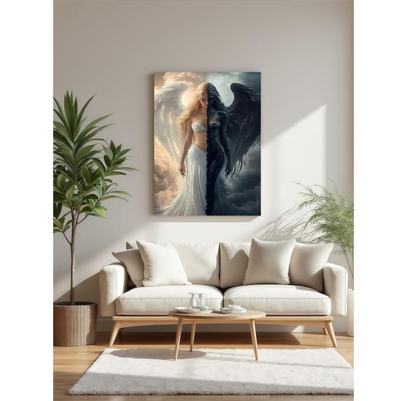 May include: A rectangular wall art print featuring a split composition of two figures. On the left, a light-skinned figure with large white wings and a white dress against a golden sky. On the right, a dark-skinned figure with black wings.