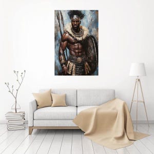 May include: A wall art print depicting a muscular warrior with dark skin, wearing a feathered collar, arm cuffs, and a patterned waist garment. The figure holds a tall spear and a large circular shield against a textured blue and grey background.