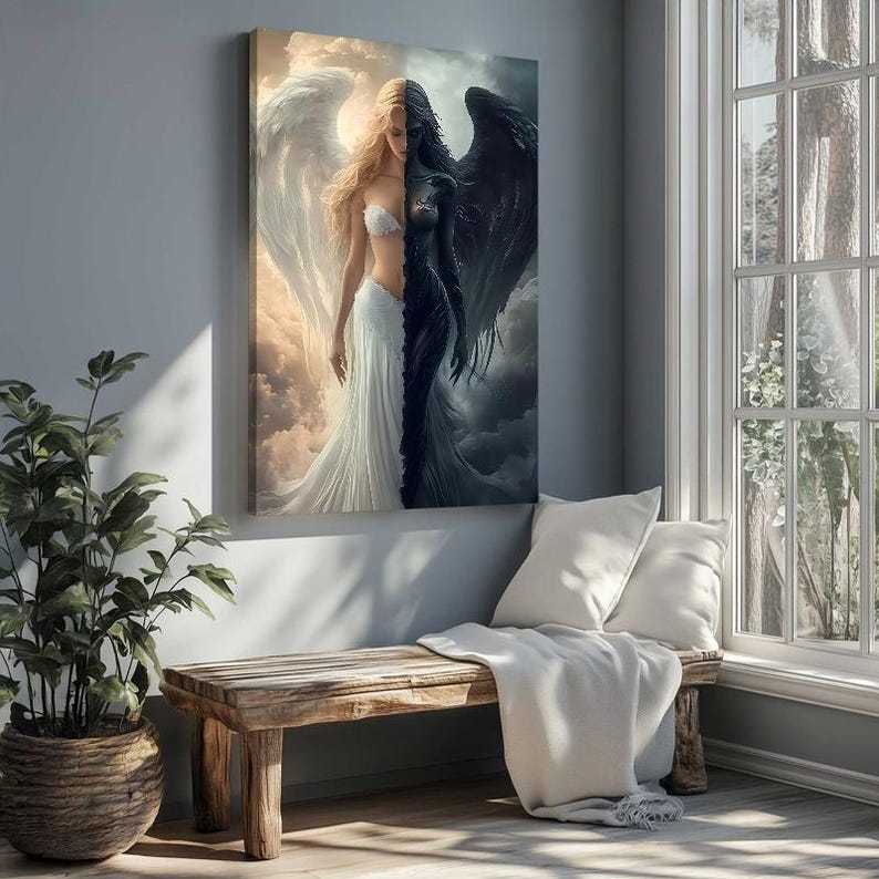 May include: A rectangular wall art print featuring a split-figure composition. One side depicts a light-skinned figure with long blonde hair and large white wings against a bright sky. The other side shows a dark-skinned figure with black wings.