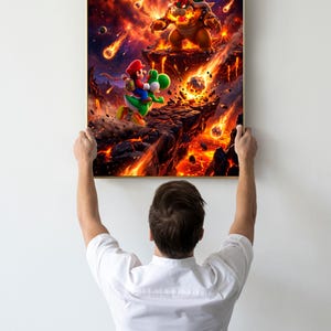May include: A framed print featuring a dynamic scene from a video game. Mario and Yoshi are running away from Bowser, who is standing on a fiery landscape. The background is filled with explosions and falling debris.