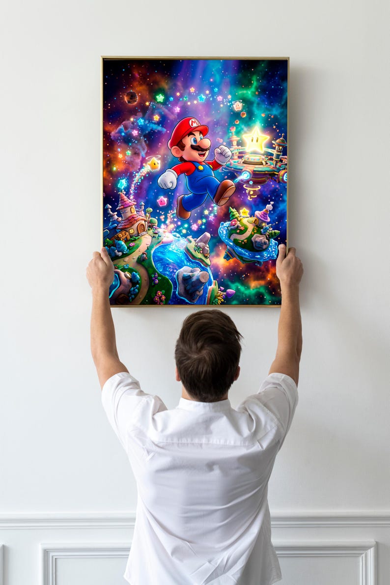 May include: A framed print depicting Mario, the video game character, in a colourful, fantastical scene. The artwork shows Mario mid-jump, surrounded by stars, floating islands, and whimsical structures. The print is held up by a person.