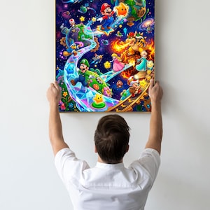 May include: A rectangular wall art print featuring a vibrant, colourful space-themed illustration of Mario, Luigi, Princess Peach, Bowser, and Toad navigating a cosmic landscape with planets, stars, and glowing paths set against a deep purple galaxy.
