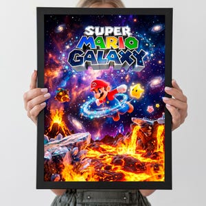 May include: A framed Super Mario Galaxy poster featuring Mario in a space-themed setting with the game's logo. The poster has a black frame and includes the text "56X MARIO GALAXY POSTERS" and "A3 SIZE" at the top.
