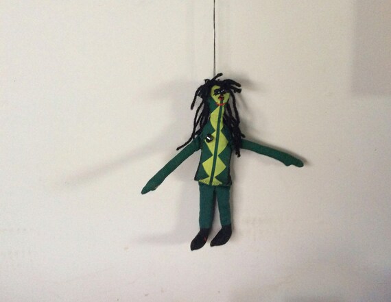 green voodoo doll