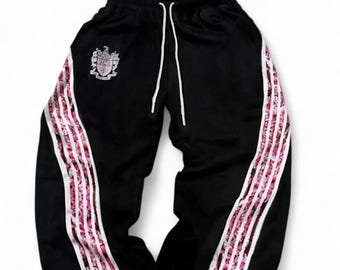 Pantalones deportivos de rayas rosas y negras