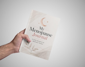 Può includere: Un diario con copertina flessibile color crema decorato con una luna crescente, illustrazioni botaniche e il testo My Menopause Journal: A Daily Symptom & Wellness Tracker di Olexior. Il design presenta accenti in rosa e marrone.