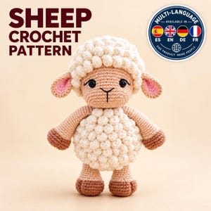 May include: A crochet sheep toy with a cream-coloured textured wool body and head, tan limbs, and pink inner ears. The text SHEEP CROCHET PATTERN is visible in the upper left corner, and a circular badge indicates multi-language availability.