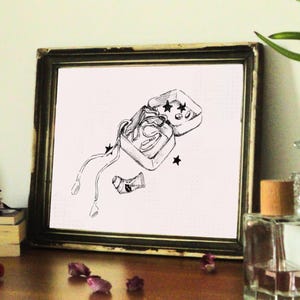 イヤホン付きのミント缶を描いた白黒の線画