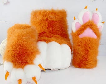 Handmade orange fursuit paws and feet; available in various fur colors, suitable for furmeets, fursuiting, and cosplay events.