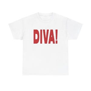 May include: A white short-sleeved t-shirt featuring the word DIVA! printed in bold red capital letters across the center of the chest. The garment has a standard crew neckline and a straight hemline, providing a clean and simple aesthetic.