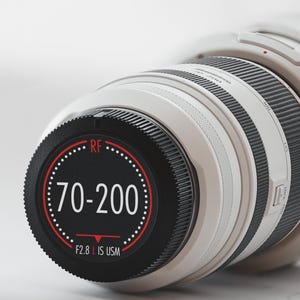 May include: A white and black camera lens with the text "70-200" and "F2.8 IS USM" on the front. The lens has a series of rings and a smooth, cylindrical body. The lens is designed for professional photography.