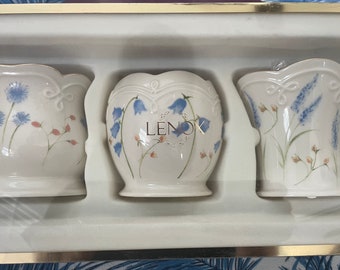 Set of three 3-1/4” high vases