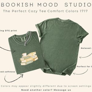 May include: Two olive green t-shirts. One shirt has a graphic of books and a teacup. The text on the image says "BOOKISH MOOD STUDIO" and "The Perfect Cozy Tee Comfort Colors 1717". The shirts have a relaxed unisex fit.