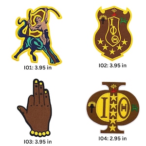 May include: Four embroidered patches: I01 is a centaur with a bow, 3.95 inches; I02 is a brown shield with Greek letters and stars, 3.95 inches; I03 is a brown hand with yellow fingernails and beads, 3.95 inches; I04 is a brown emblem, 2.95 inches.