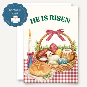 May include: A printable Easter card with the text "HE IS RISEN" in green. The card features a basket with decorated eggs, a lamb, and a loaf of bread. A lit candle and a red and white checkered pattern complete the design.