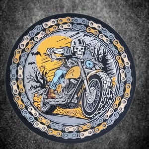 May include: A circular embroidered patch featuring a skeleton wearing a helmet and riding a motorcycle. The design includes a yellow full moon, bare trees, and bats in the background, all framed by a border of alternating gold and silver motorcycle chain links.