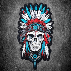May include: An embroidered patch featuring a human skull wearing a vibrant headdress made of white, red, and turquoise feathers. The skull is adorned with a decorative headband and a multi-layered beaded necklace with a central turquoise circular charm.