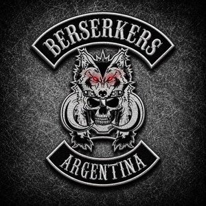 May include: A black and white embroidered patch featuring a central graphic of a wolf head wearing a skull, with glowing red eyes. The word BERSERKERS is arched above in white text, and the word ARGENTINA is arched below in white text.