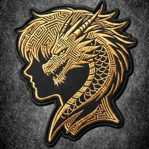 May include: An embroidered patch featuring a black silhouette of a human profile merged with a detailed golden dragon. The dragon design is composed of intricate geometric lines and patterns, with a sharp, textured border outlining the entire shape.