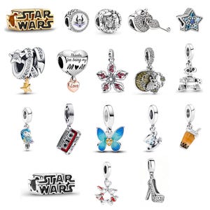 May include: A collection of silver and gold-toned charm beads. Designs include a Star Wars logo, a butterfly, a high heel, a cassette tape, a robot, a flower, and a heart with the words "Thanks for being my M♡M Love".
