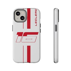 May include: White phone case featuring red vertical stripes and the number "16" in red. The word "LECLERC" is printed vertically in red. The phone case is shown from the front and side.