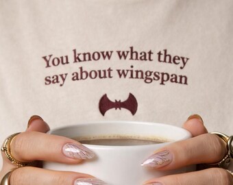 Romantasy Shirt, BookTok Shirt, Fantasy Reader Shirt – Unisex T Shirt Beige – You Know What They Say About Wingspan – Smut Reader Shirt