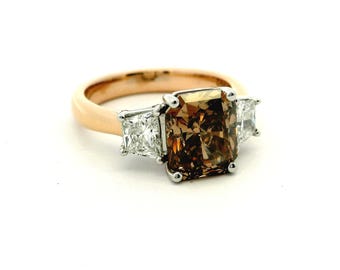 18k Rose Gold and Platinum 3-Stone Diamond Ring.  GIA Natural Radiant.