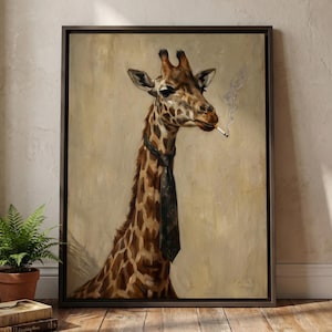 May include: A framed art print featuring a giraffe wearing a black tie and smoking a cigarette. The giraffe has brown and tan spots, and the background is a neutral beige. The artwork is displayed in a room with a wooden floor and a potted plant.