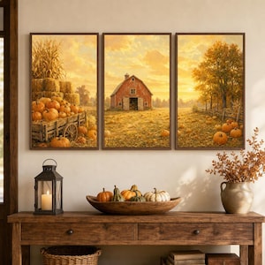 May include: A triptych wall art set depicting a rural autumn landscape with a red barn, a wooden wagon filled with orange pumpkins, and golden fields under a sunset sky. The scene features harvested crops, trees, and scattered pumpkins.