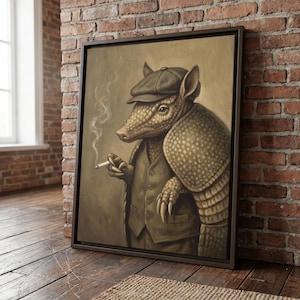 May include: Framed artwork featuring an anthropomorphic armadillo in a suit and cap, smoking a cigarette. The armadillo is depicted in shades of brown and tan, with a detailed texture. The artwork is framed in a dark brown frame.