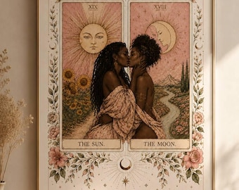 May include: A framed wall art print featuring two tarot cards side-by-side titled THE SUN and THE MOON. The illustration depicts two people embracing and kissing, surrounded by sunflowers, a winding river, floral borders, and celestial motifs.