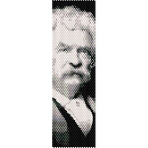 May include: Black and white beaded portrait of a man with a moustache and a serious expression. He is wearing a dark suit and a white shirt.