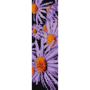 May include: A close-up of a purple and orange daisy flower pattern. The pattern is made up of many small squares, creating a pixelated effect.