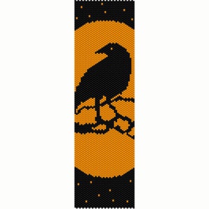 May include: Black and orange beaded bracelet with a silhouette of a raven perched on a branch in front of a full moon.