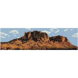 May include: A pixelated image of a brown mountain range against a blue sky with white clouds.